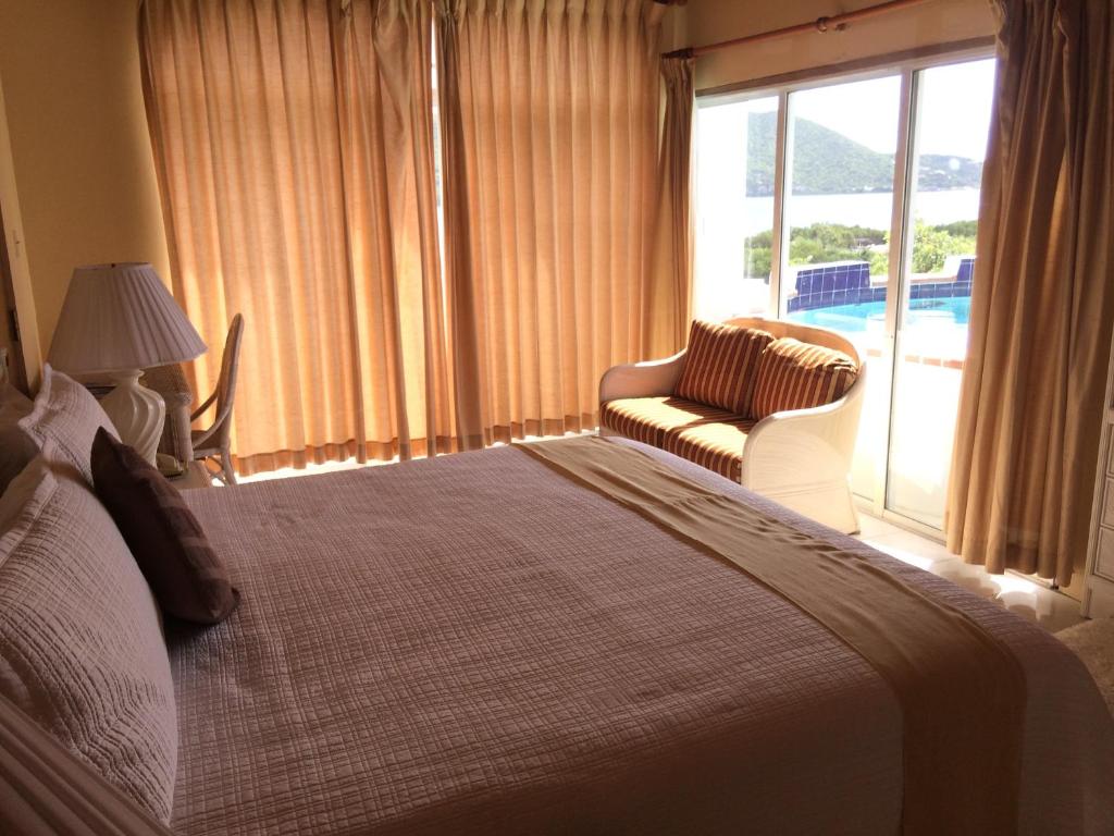 Postel nebo postele na pokoji v ubytování Fort Burt Hotel