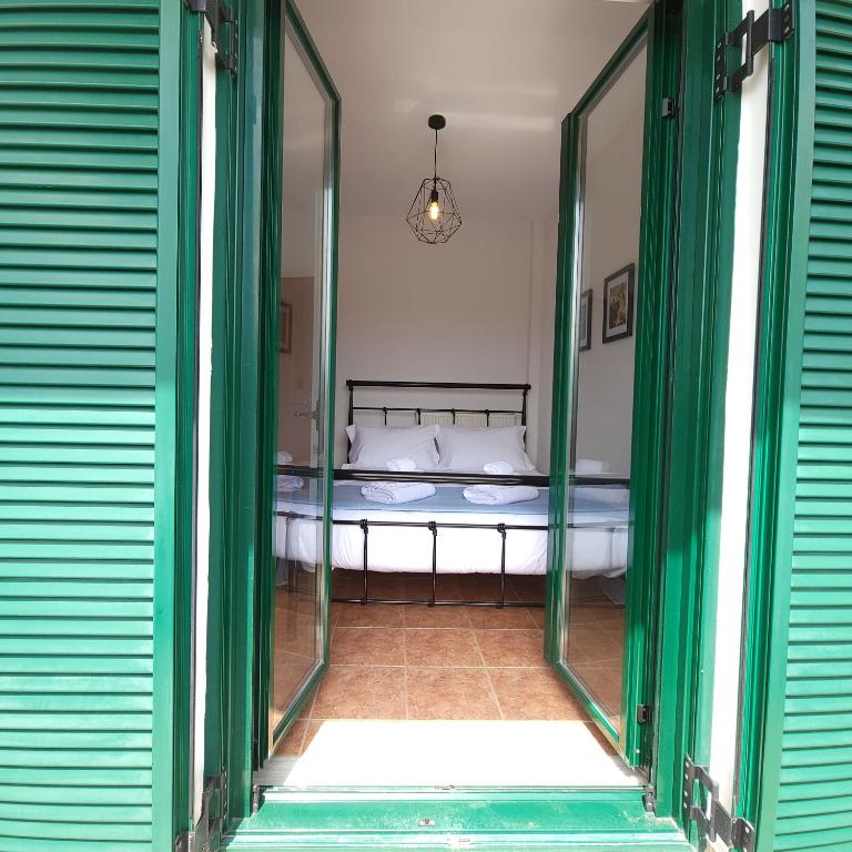 Postel nebo postele na pokoji v ubytování Paradisos Villa - Chania, Crete