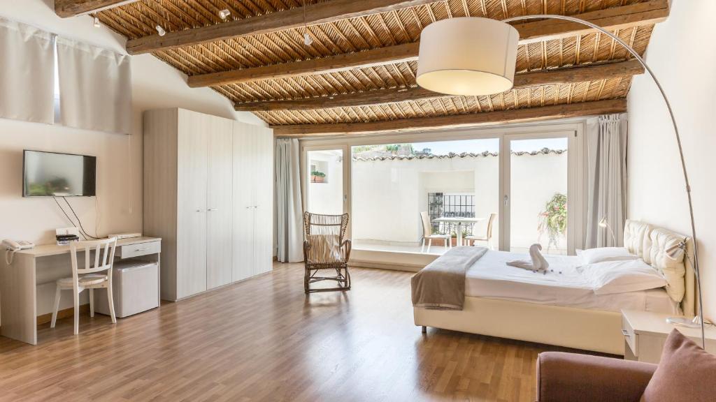 Postel nebo postele na pokoji v ubytování Scicli Albergo Diffuso