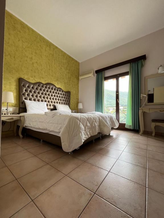 Postel nebo postele na pokoji v ubytování Palatino Hotel