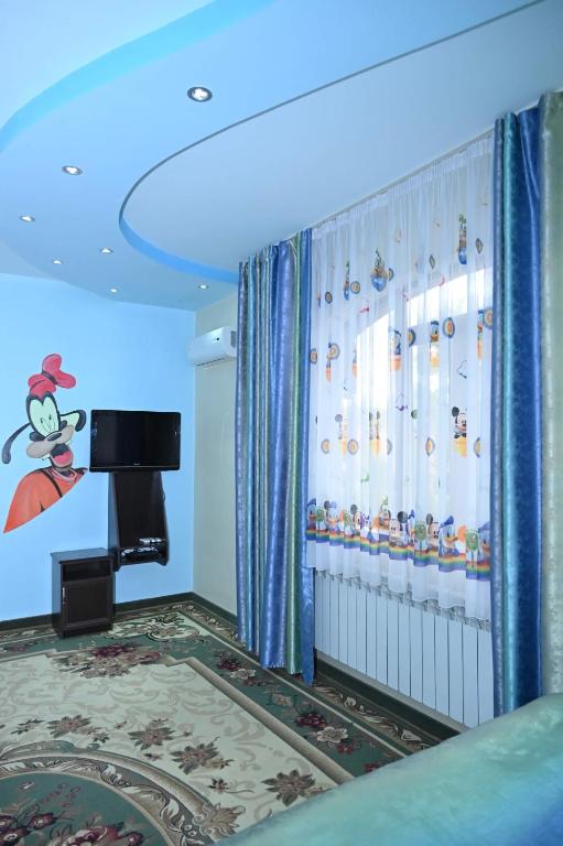 TV a/nebo společenská místnost v ubytování Mayisyan Kamurj Hotel