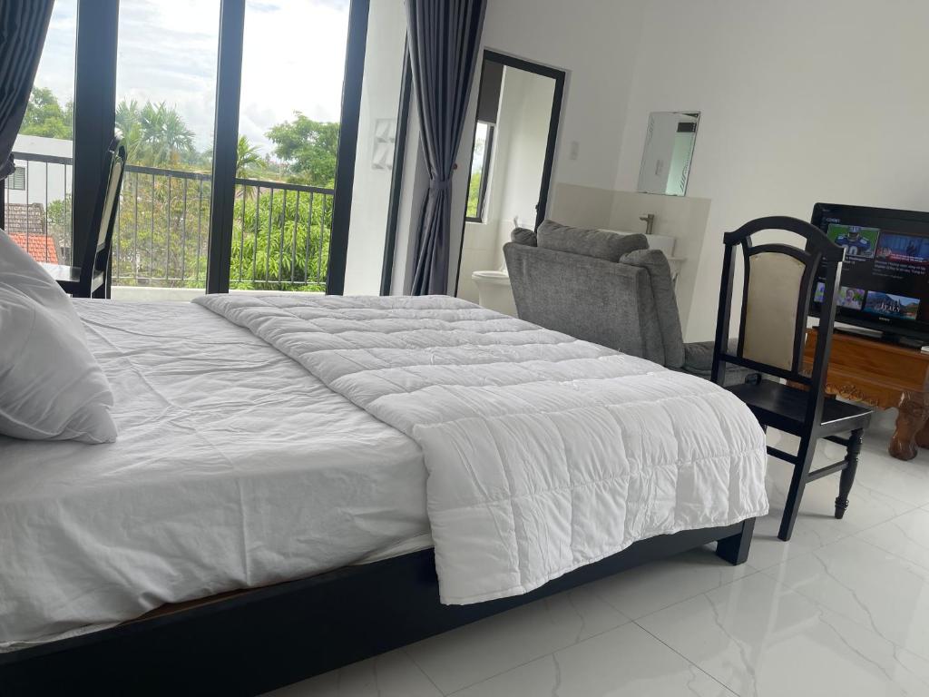 Postel nebo postele na pokoji v ubytování Moon house villa