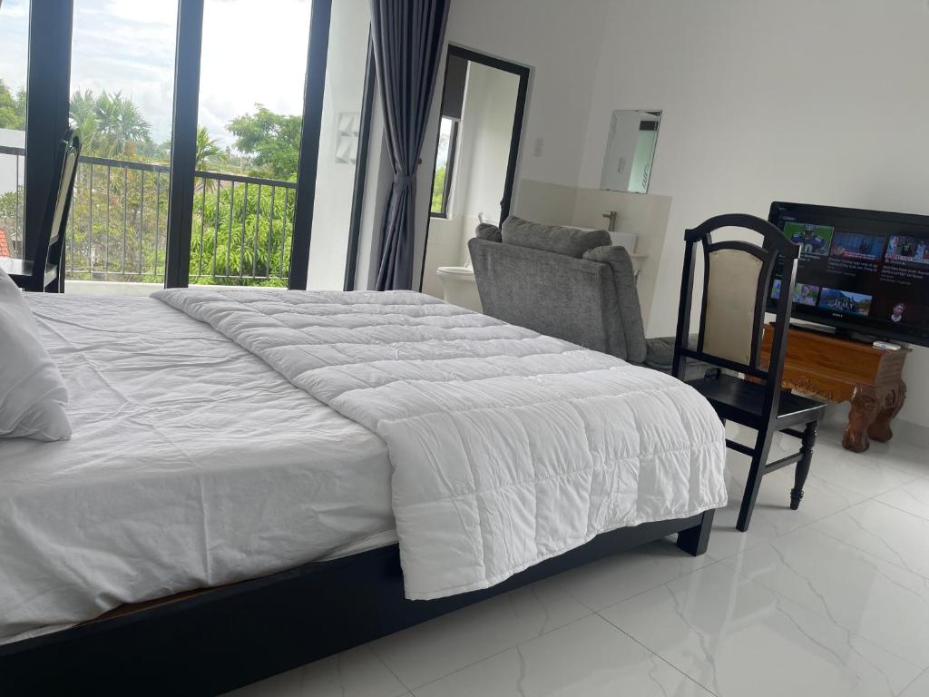 Postel nebo postele na pokoji v ubytování Moon house villa