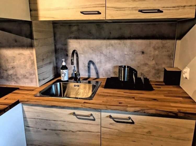 Kuchyň nebo kuchyňský kout v ubytování Morska Ostoja Chłapowo