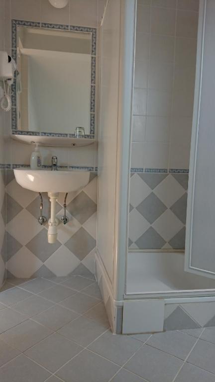 Koupelna v ubytování Hotel Napsugár