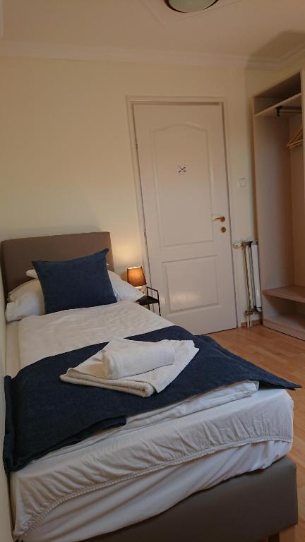 Postel nebo postele na pokoji v ubytování Hotel Napsugár
