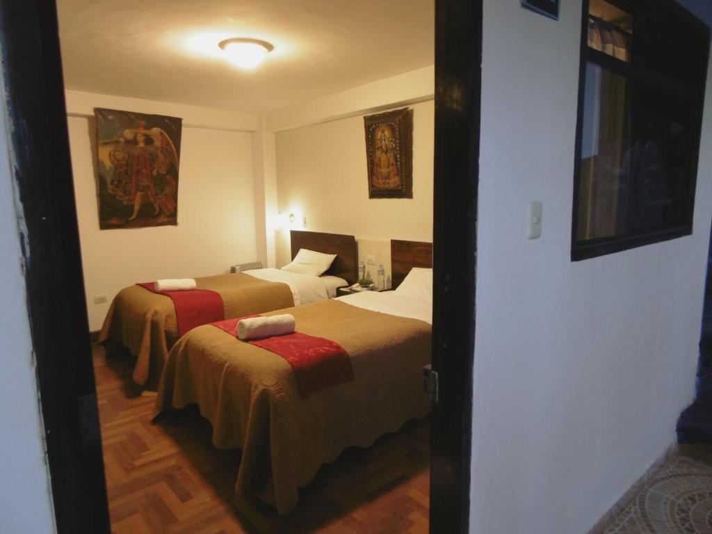 Letto o letti in una camera di Hotel Montecristo Cusco