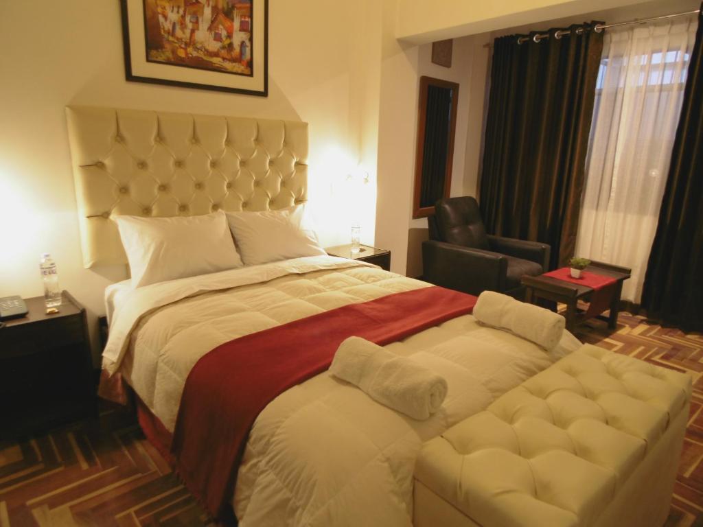 Letto o letti in una camera di Hotel Montecristo Cusco