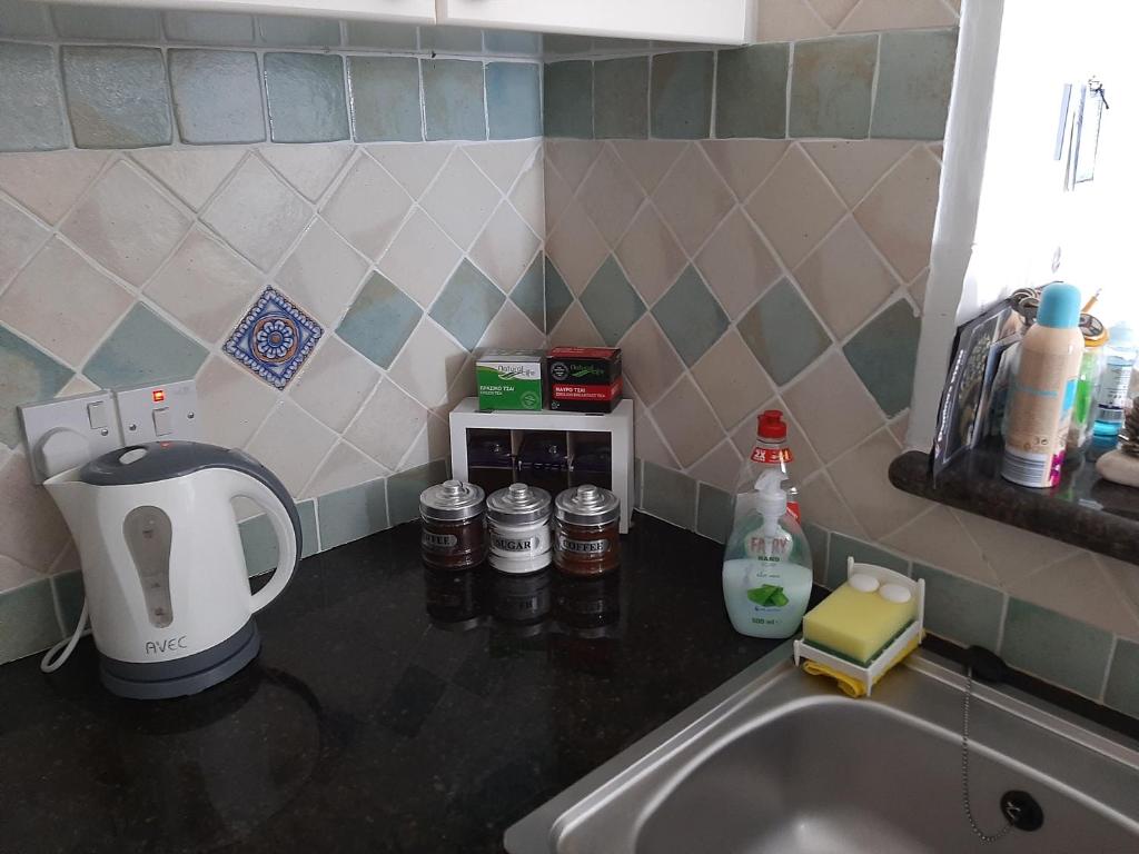 Kuchyň nebo kuchyňský kout v ubytování H&O Best Apt In Paphos!