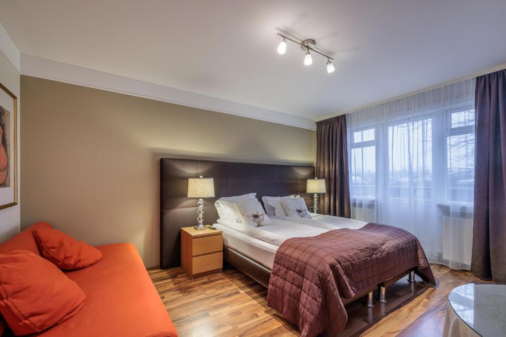 Postel nebo postele na pokoji v ubytování Snorri's Guesthouse