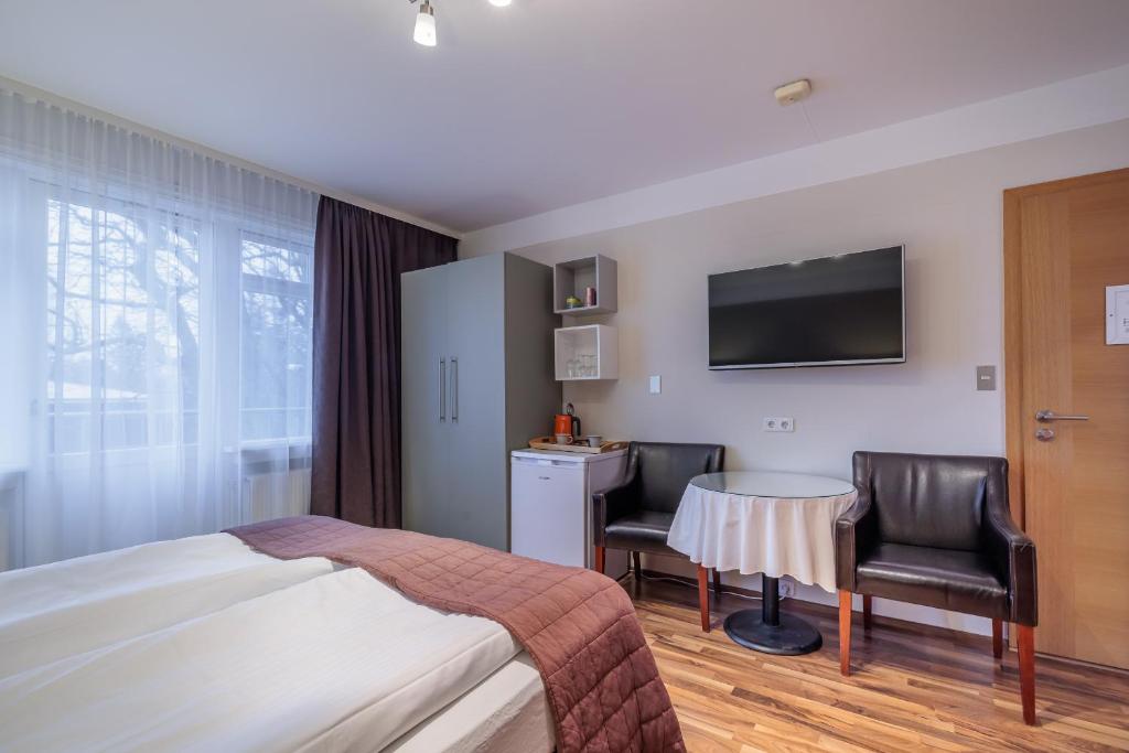 TV a/nebo společenská místnost v ubytování Snorri's Guesthouse