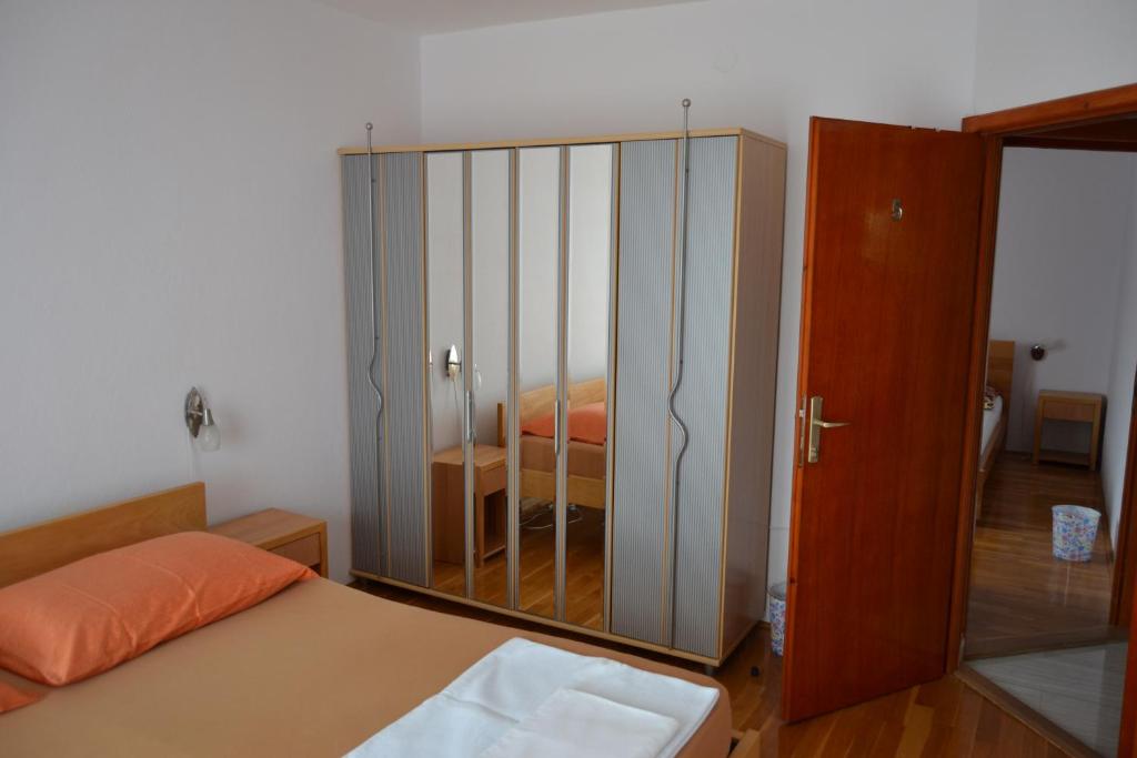 Postel nebo postele na pokoji v ubytování Tivat Apartments