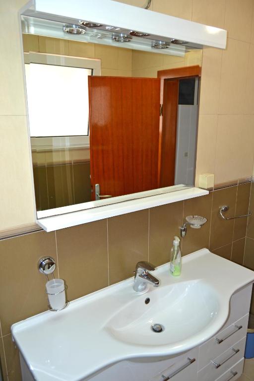 Koupelna v ubytování Tivat Apartments