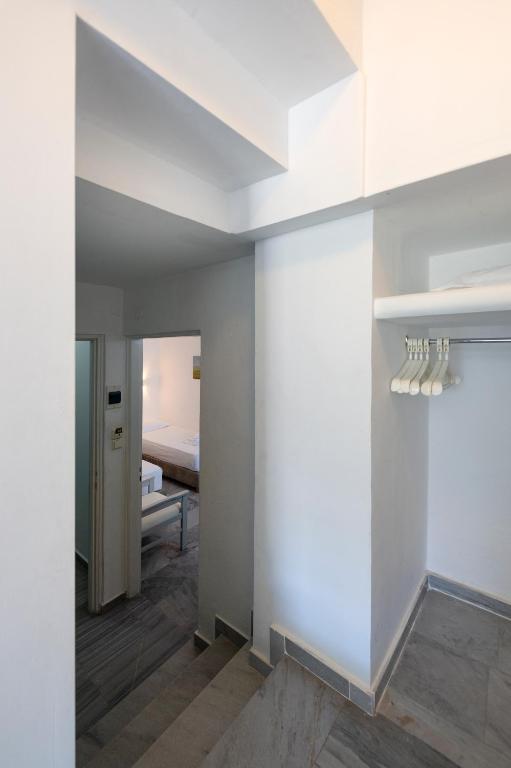 Llit o llits en una habitació de Hotel Aegeon