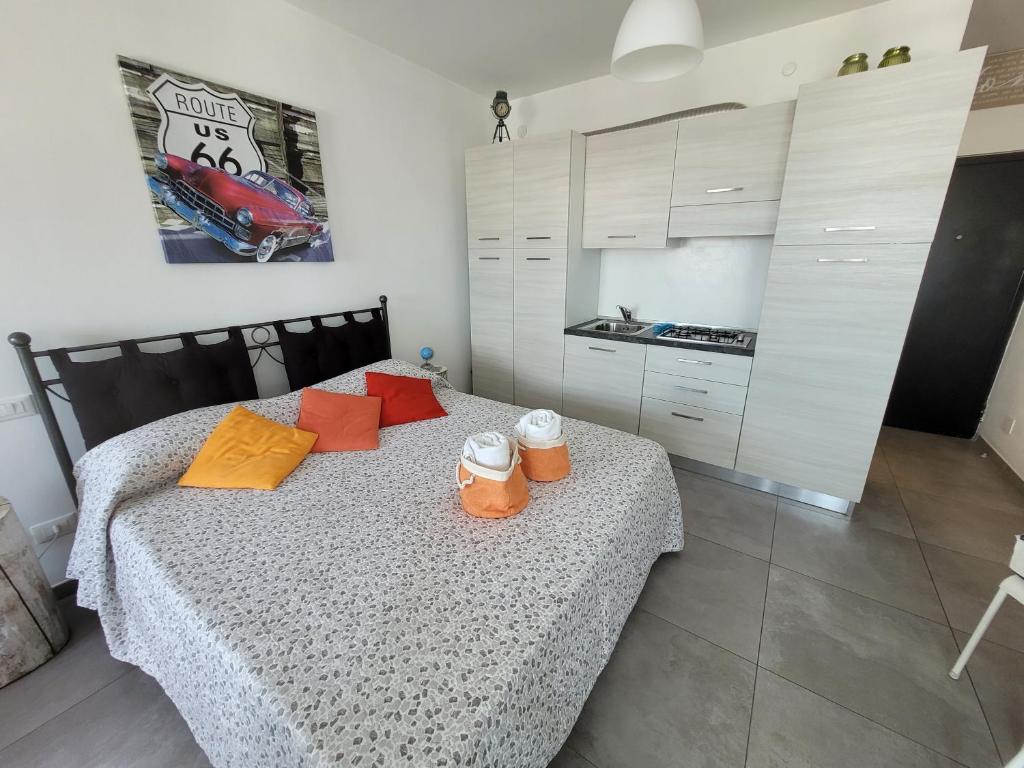 Кровать или кровати в номере Rosato 2 Sea View Apartment