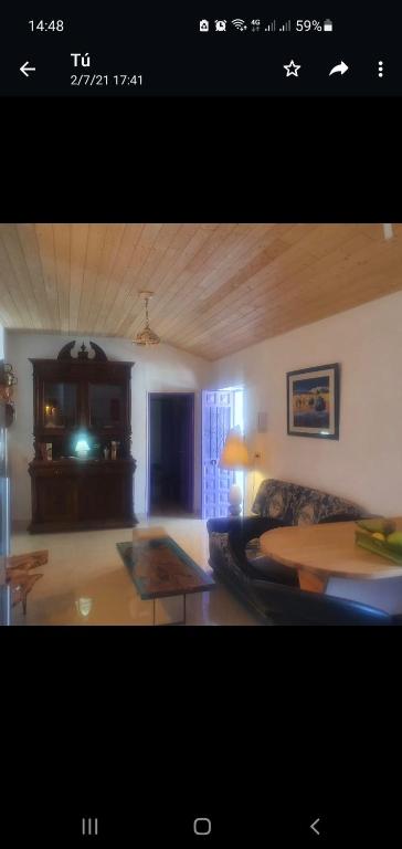Televízia a/alebo spoločenská miestnosť v ubytovaní Casa papi