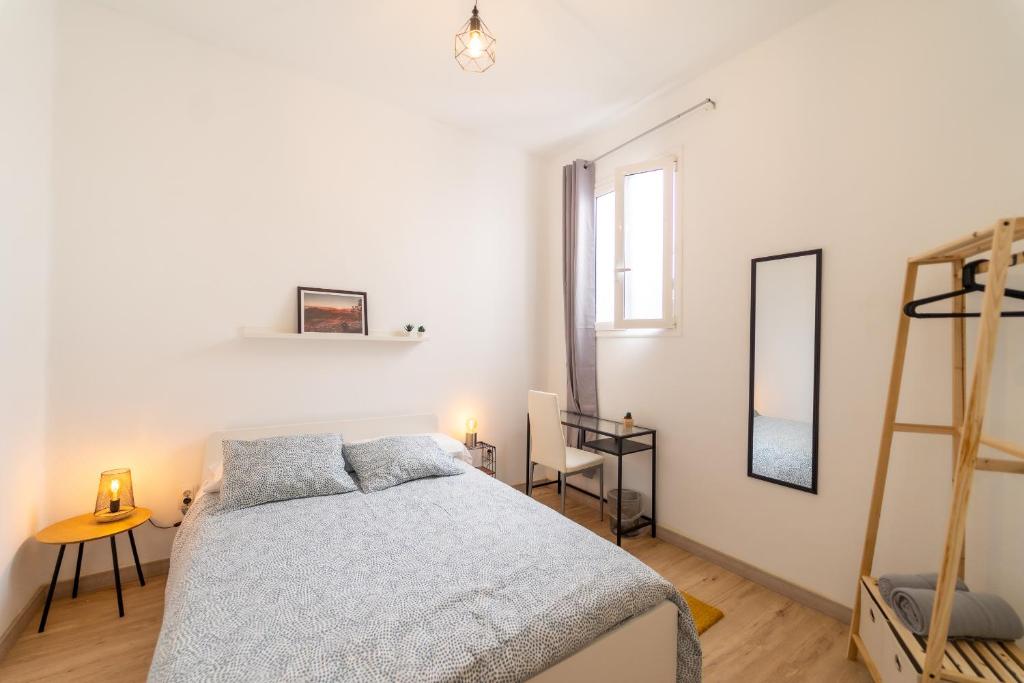 Postel nebo postele na pokoji v ubytování Un Lugar House Canteras - Coliving