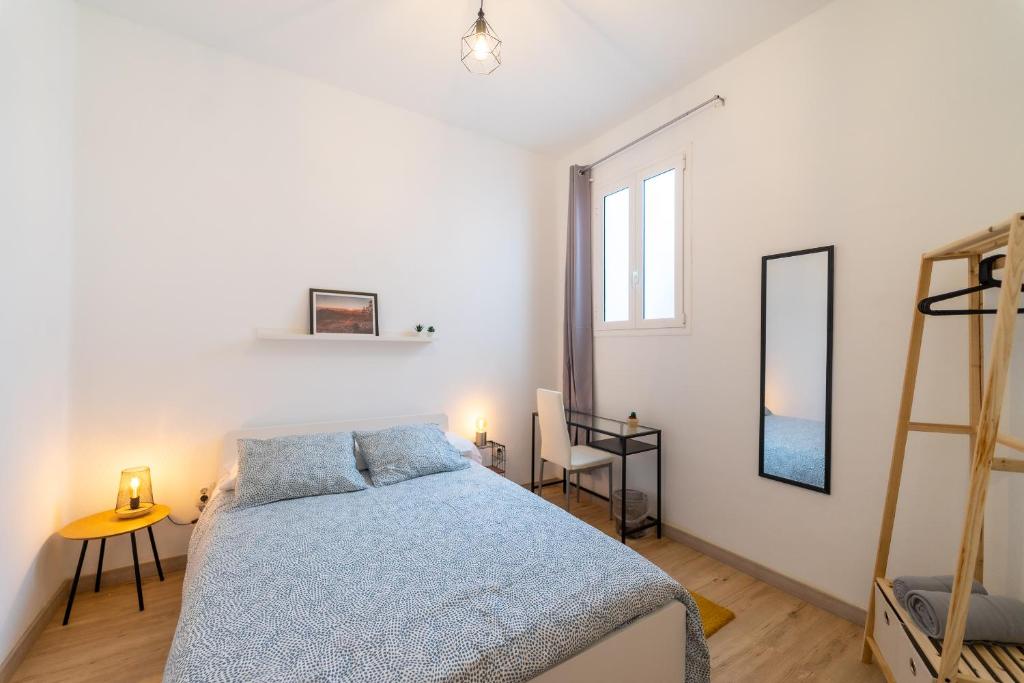 Postel nebo postele na pokoji v ubytování Un Lugar House Canteras - Coliving