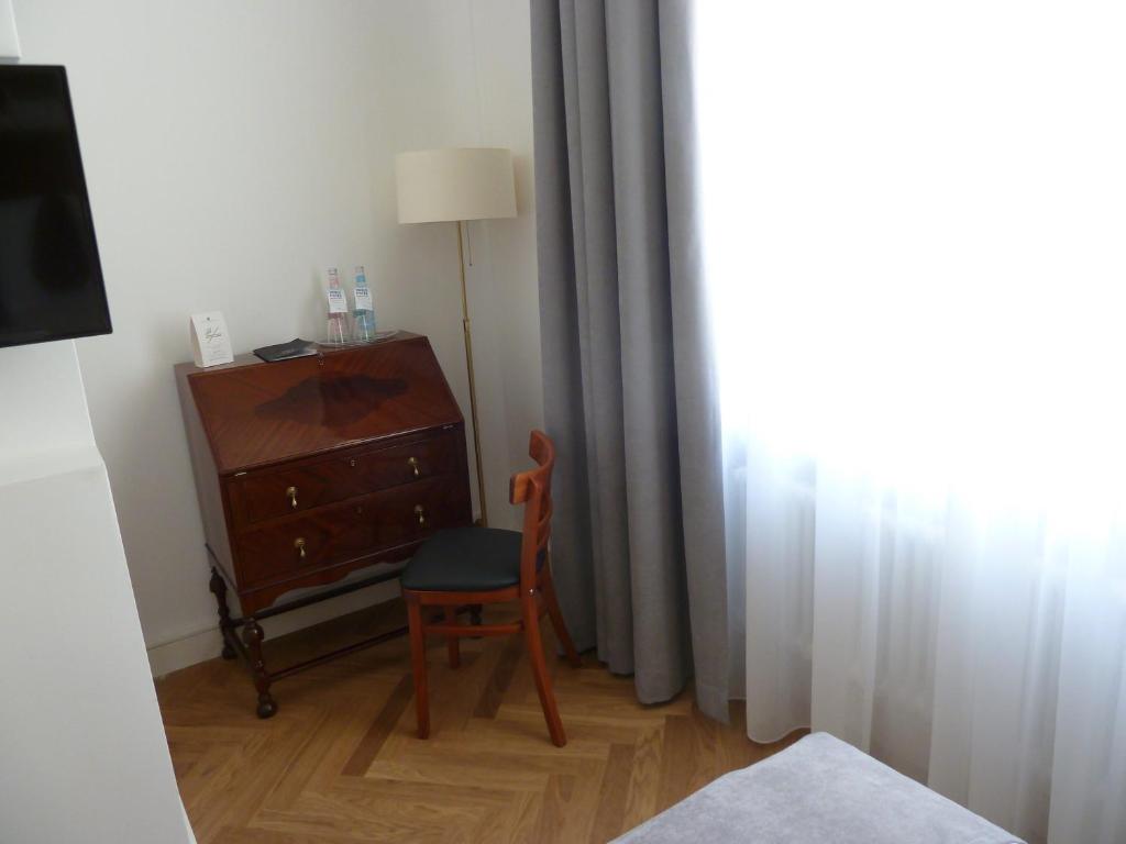 Postel nebo postele na pokoji v ubytování Hotel Lindenufer