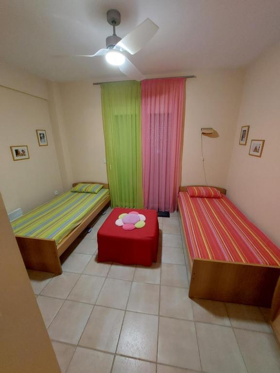 Postel nebo postele na pokoji v ubytování Siviri_Inn