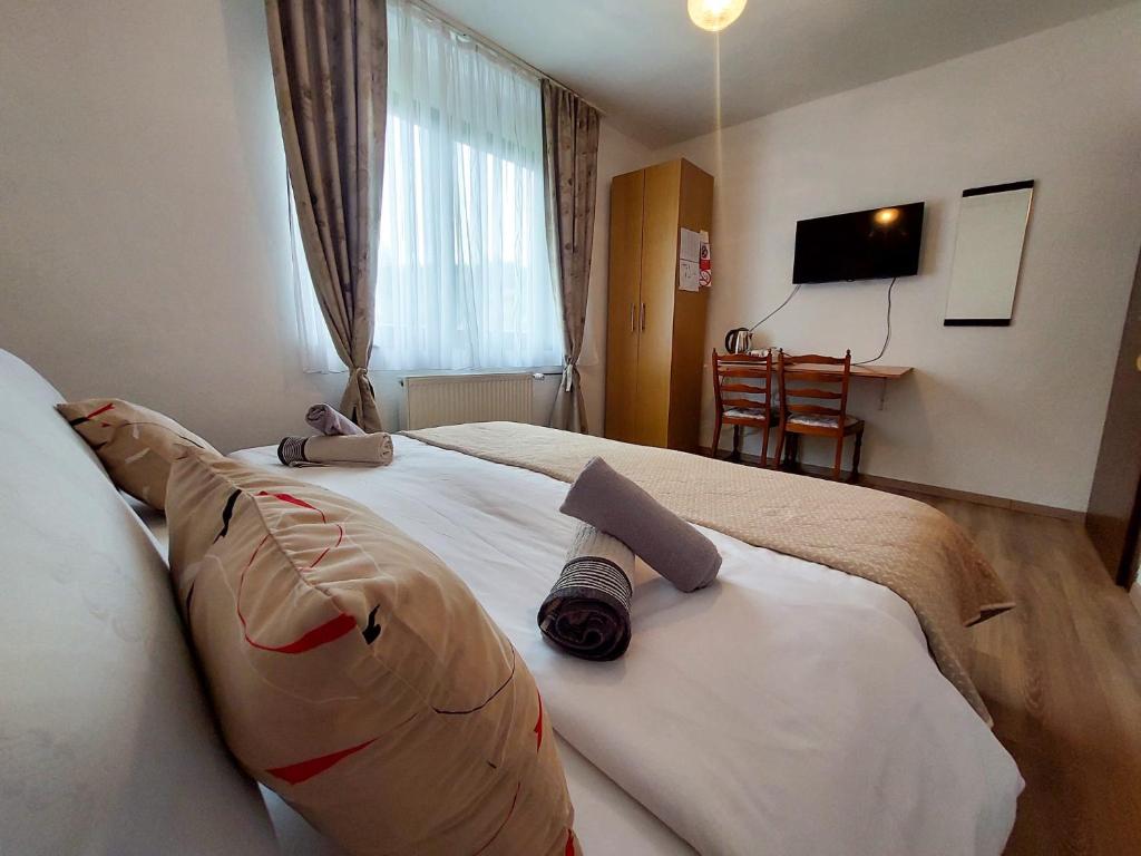 Voodi või voodid majutusasutuse Lazy Bear toas