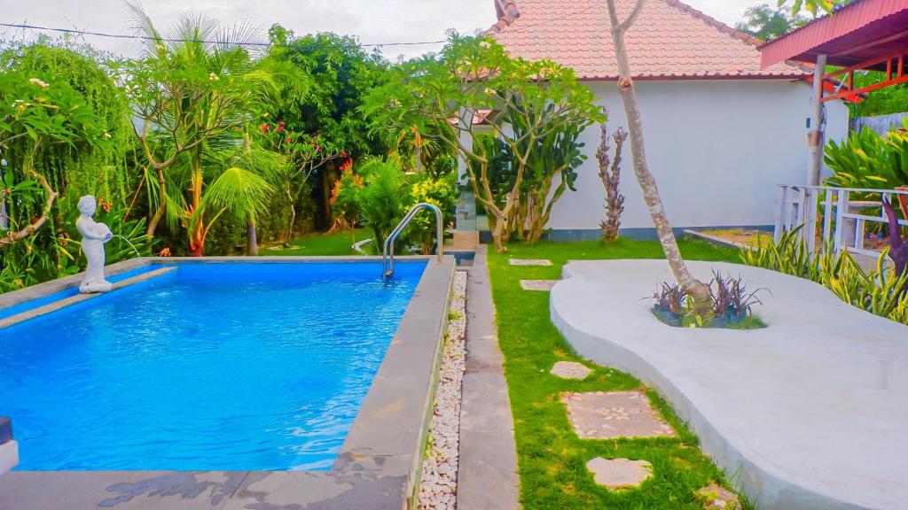 Bazén v ubytování Kuri Garden Cottage nebo v jeho okolí