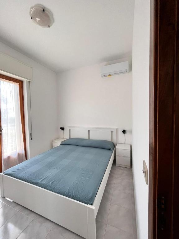 Postel nebo postele na pokoji v ubytování suli e mari