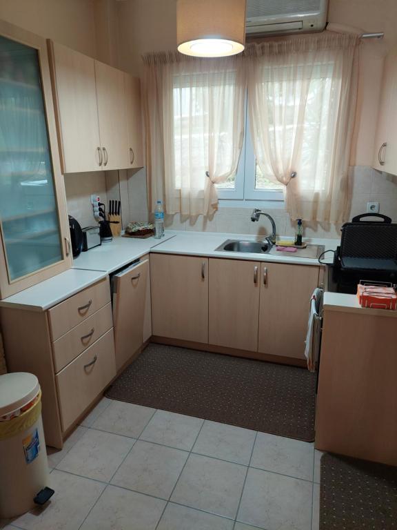 Kuchyň nebo kuchyňský kout v ubytování Siviri_Inn