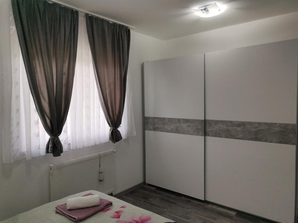 Posteľ alebo postele v izbe v ubytovaní Apartmani "Marina"