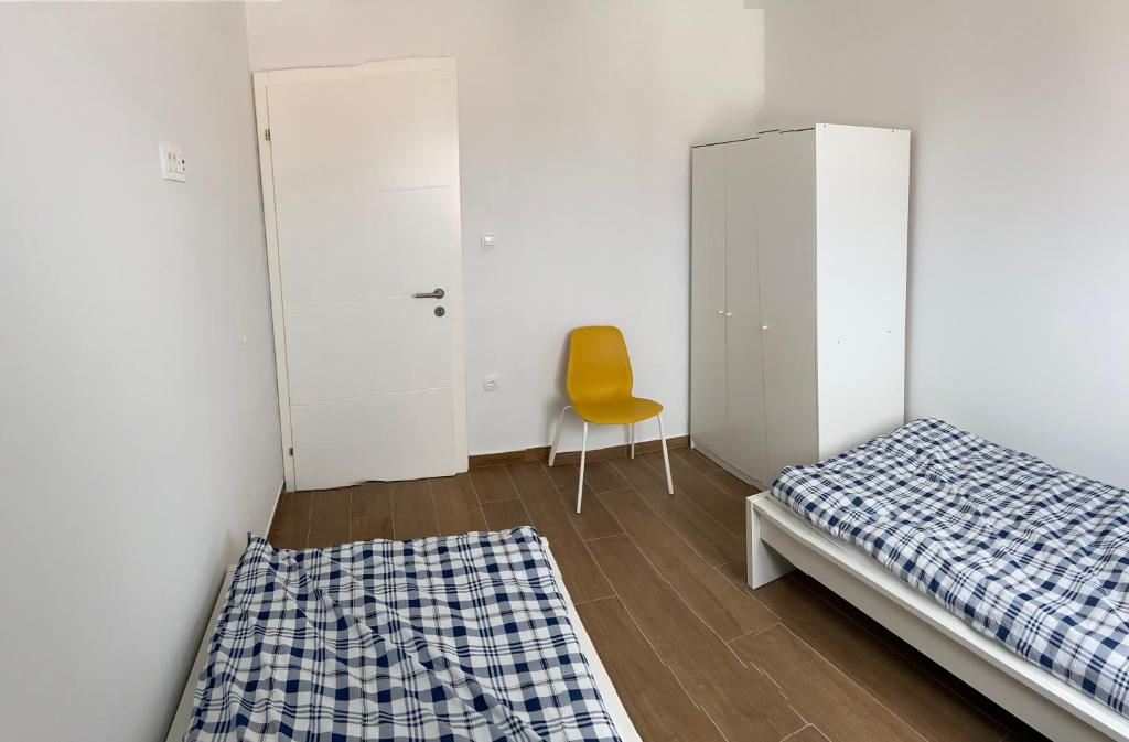 Posteľ alebo postele v izbe v ubytovaní Daniela Family Apartment - top floor - new & quite location - great sea & island view