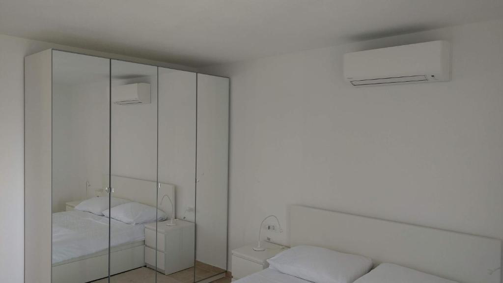 Postel nebo postele na pokoji v ubytování Mira