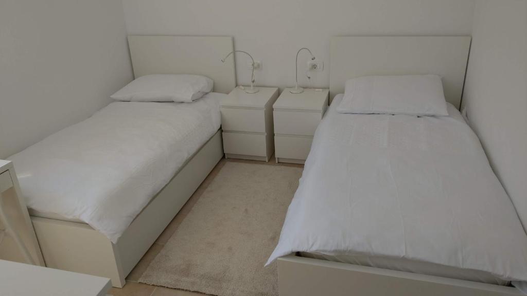 Postel nebo postele na pokoji v ubytování Mira