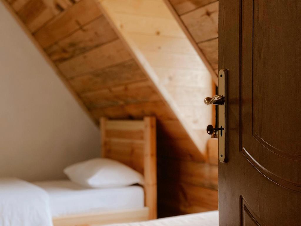 Llit o llits en una habitació de Guesthouse Pashko
