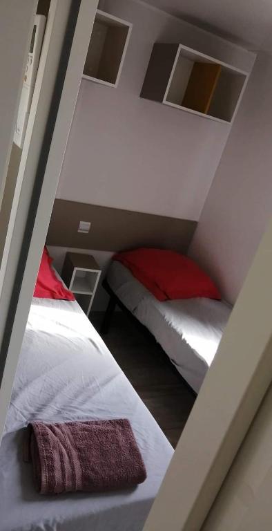 Postel nebo postele na pokoji v ubytování Ferme de Chiuni
