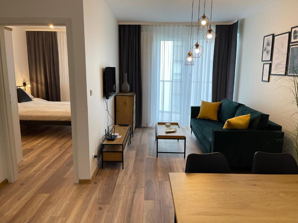 Posteľ alebo postele v izbe v ubytovaní NEWPORT Industrial Apartment