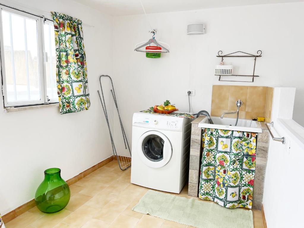Kuchyňa alebo kuchynka v ubytovaní Amari Residence