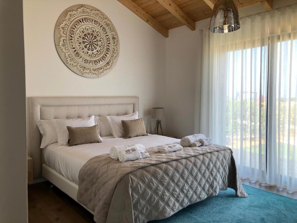 Quinta do Planalto Vicentino - Casas de Campo tesisinde bir odada yatak veya yataklar
