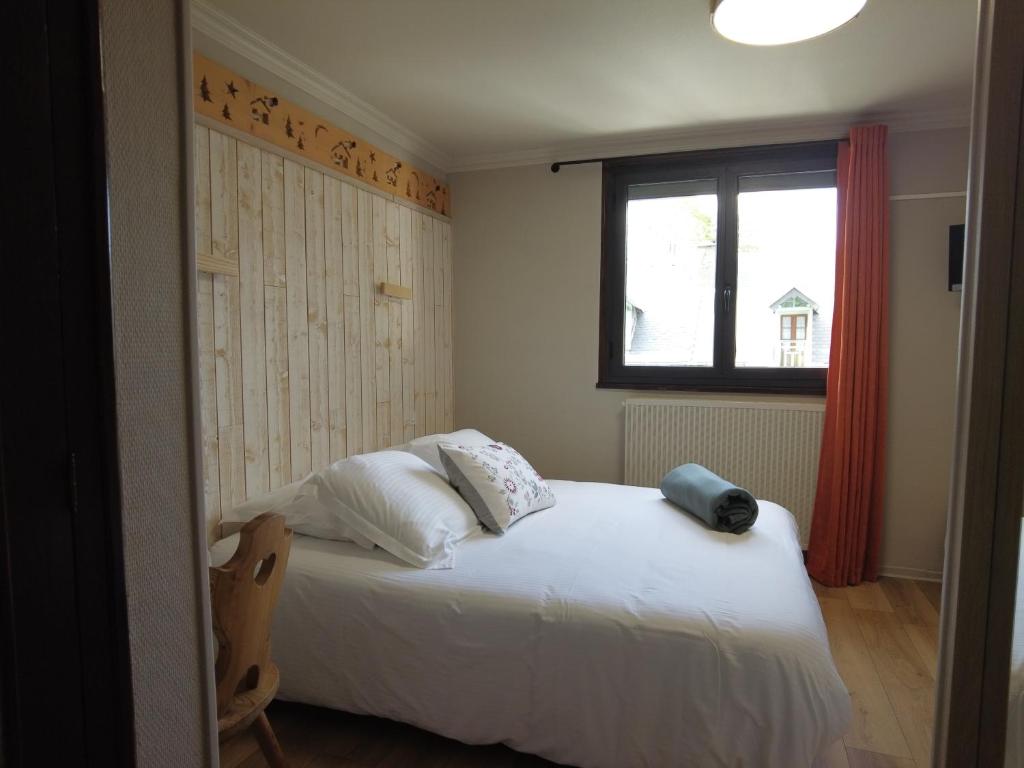 Postel nebo postele na pokoji v ubytování Hôtel La Rencluse