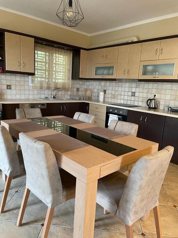 Kuchyňa alebo kuchynka v ubytovaní Melina Apartment