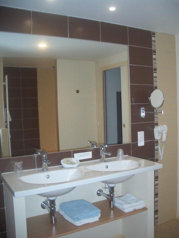 Koupelna v ubytování Hotel Colombié