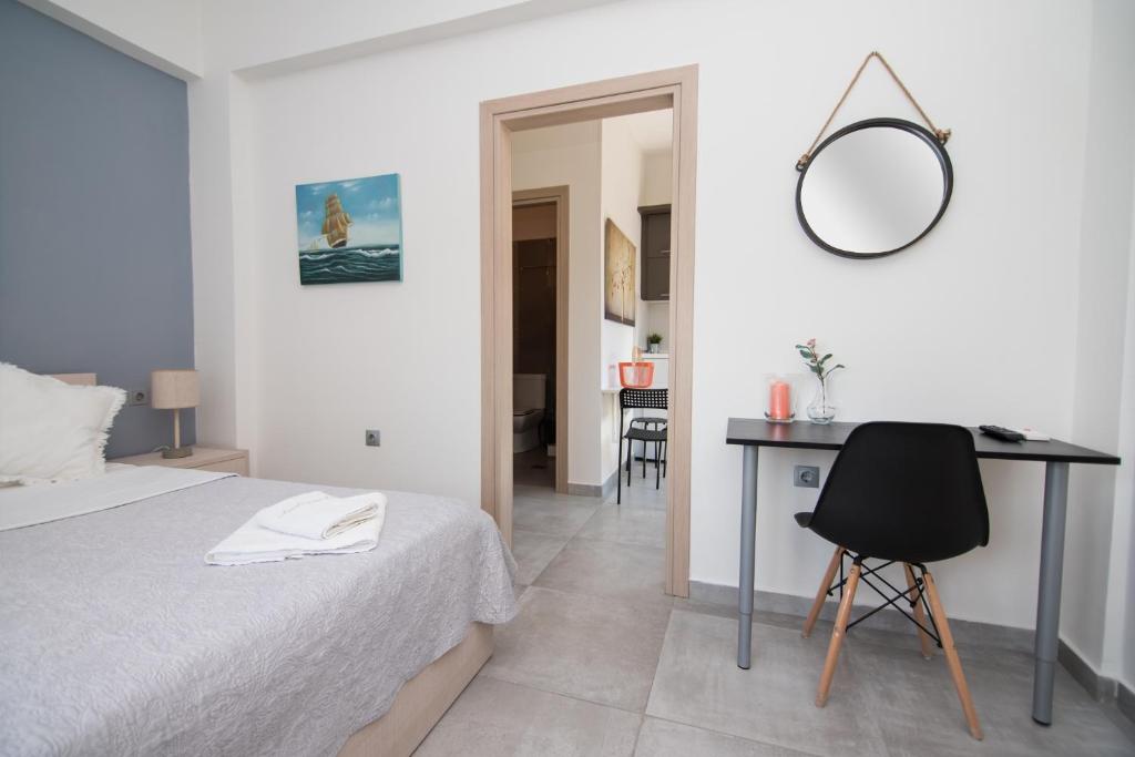 Posteľ alebo postele v izbe v ubytovaní Andromeda's Apartments