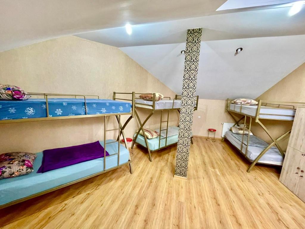 Postel nebo postele na pokoji v ubytování Hostel 13
