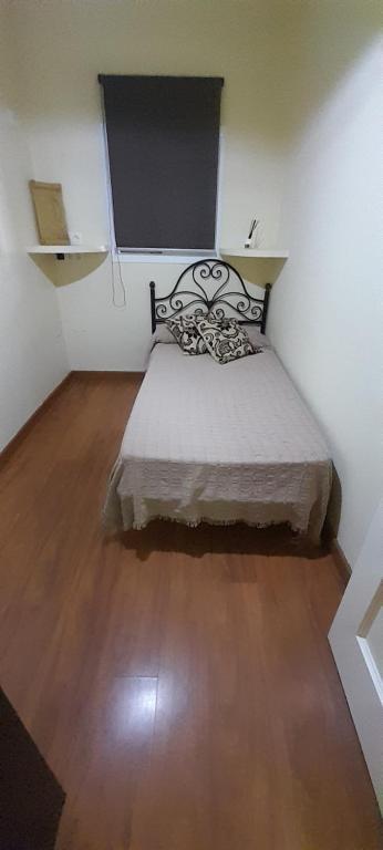Postel nebo postele na pokoji v ubytování Emperador Carlos