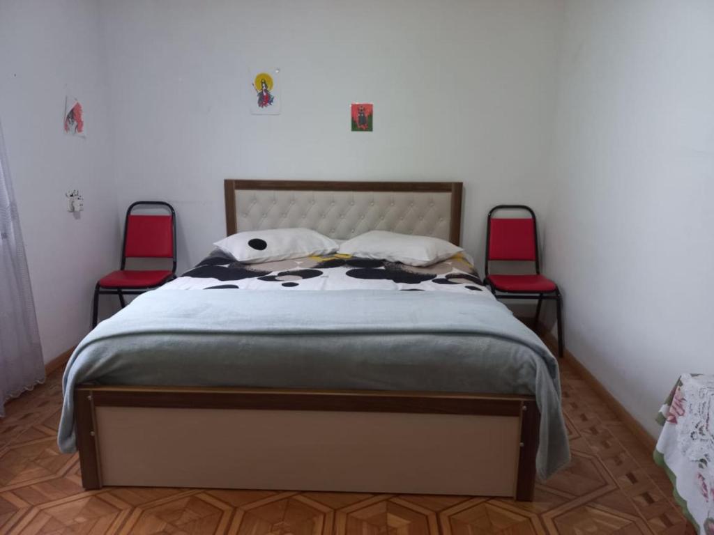 Postel nebo postele na pokoji v ubytování Сибиряк