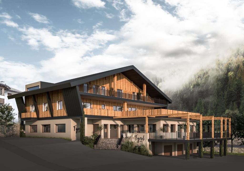 eine Darstellung eines Hauses mit Bergen im Hintergrund in der Unterkunft Tyrol Living & Cafe in Welschnofen