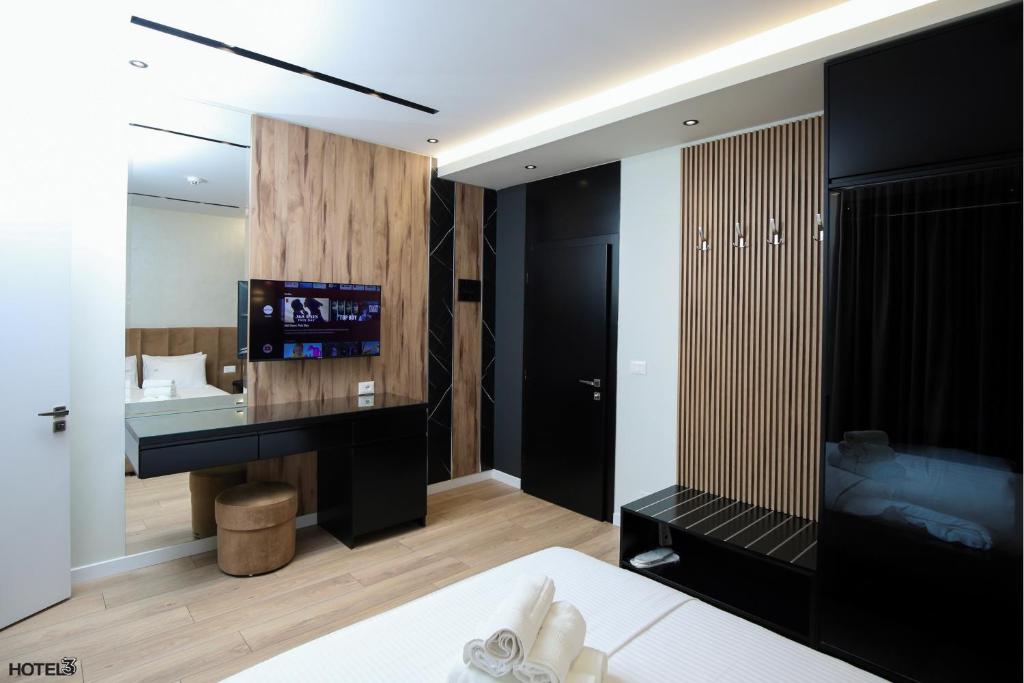 Postel nebo postele na pokoji v ubytování Hotel Three
