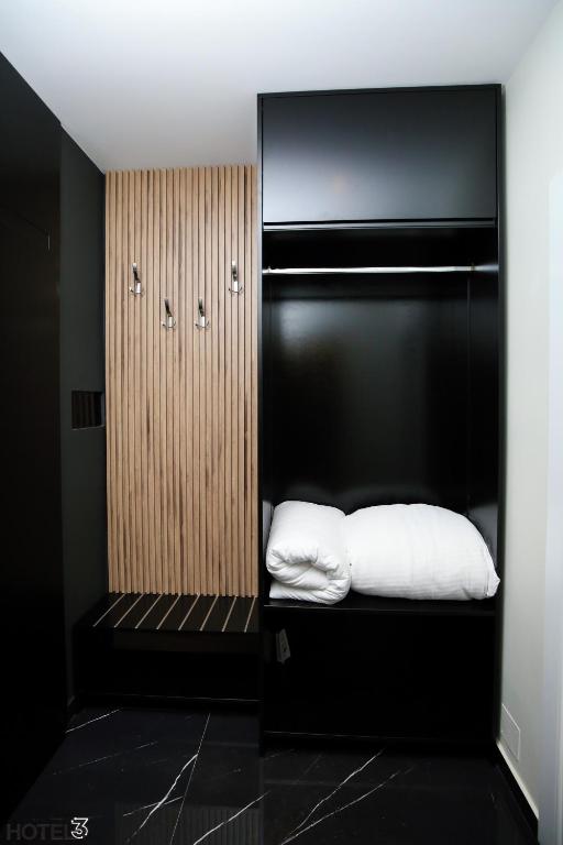 Postel nebo postele na pokoji v ubytování Hotel Three