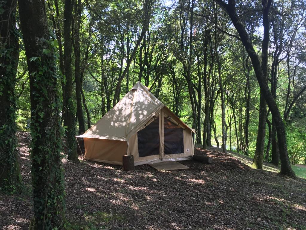 a tent sitting in the middle of a forest at ACAMPALE - Glamping La Garrotxa - Santa Pau in Santa Pau