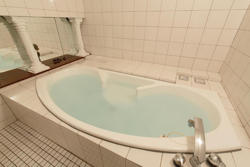 Koupelna v ubytování 隠家(ajito) HOTEL555 御殿場2