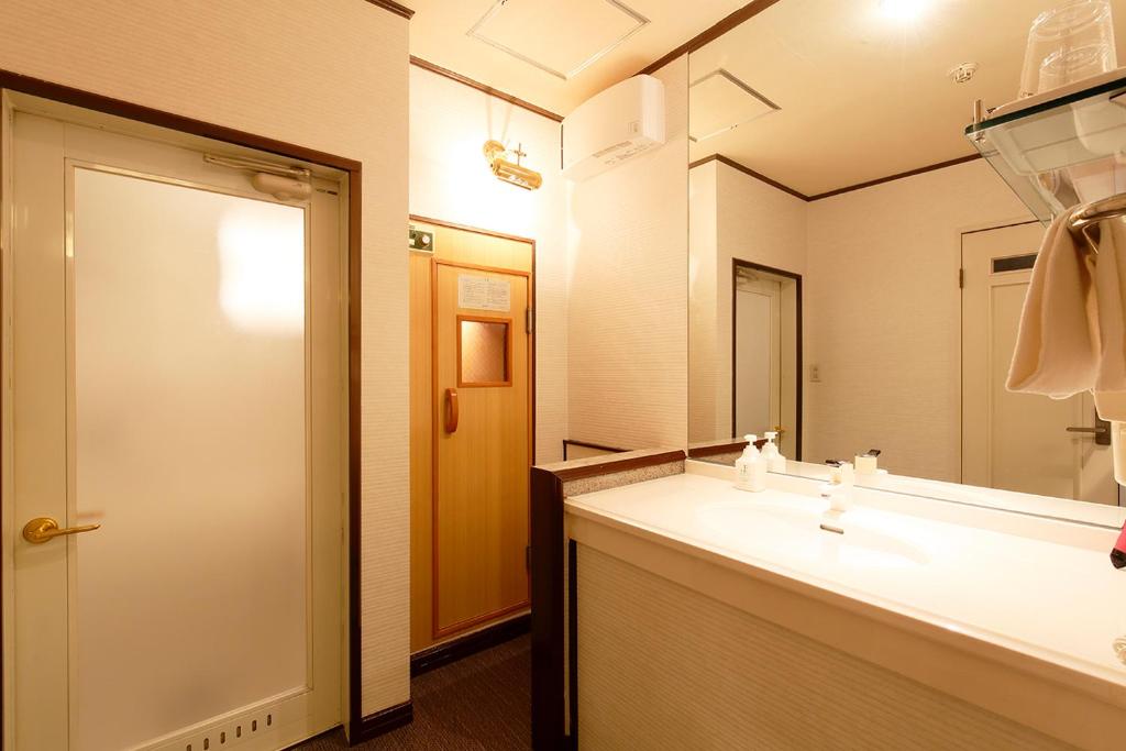 Koupelna v ubytování 隠家(ajito) HOTEL555 御殿場2